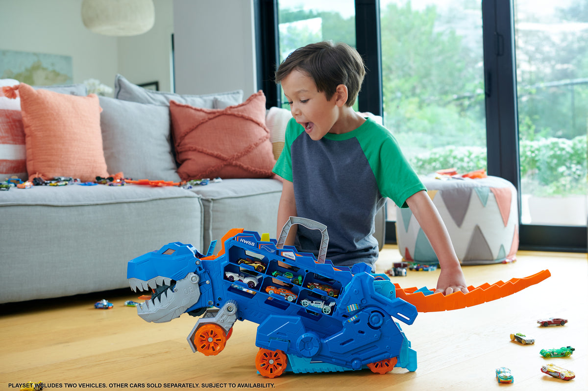 Hot Wheels™ City Ultimate T-Rex Tır – Işıklı Sesli Dönüşen Taşıyıcı ve Yarış Pisti Seti