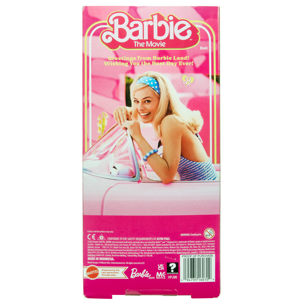 Koleksiyona uygun Barbie™ Filmi bebeği, pötikare desenli pembe elbise giyen Margot Robbie Barbie rolünde