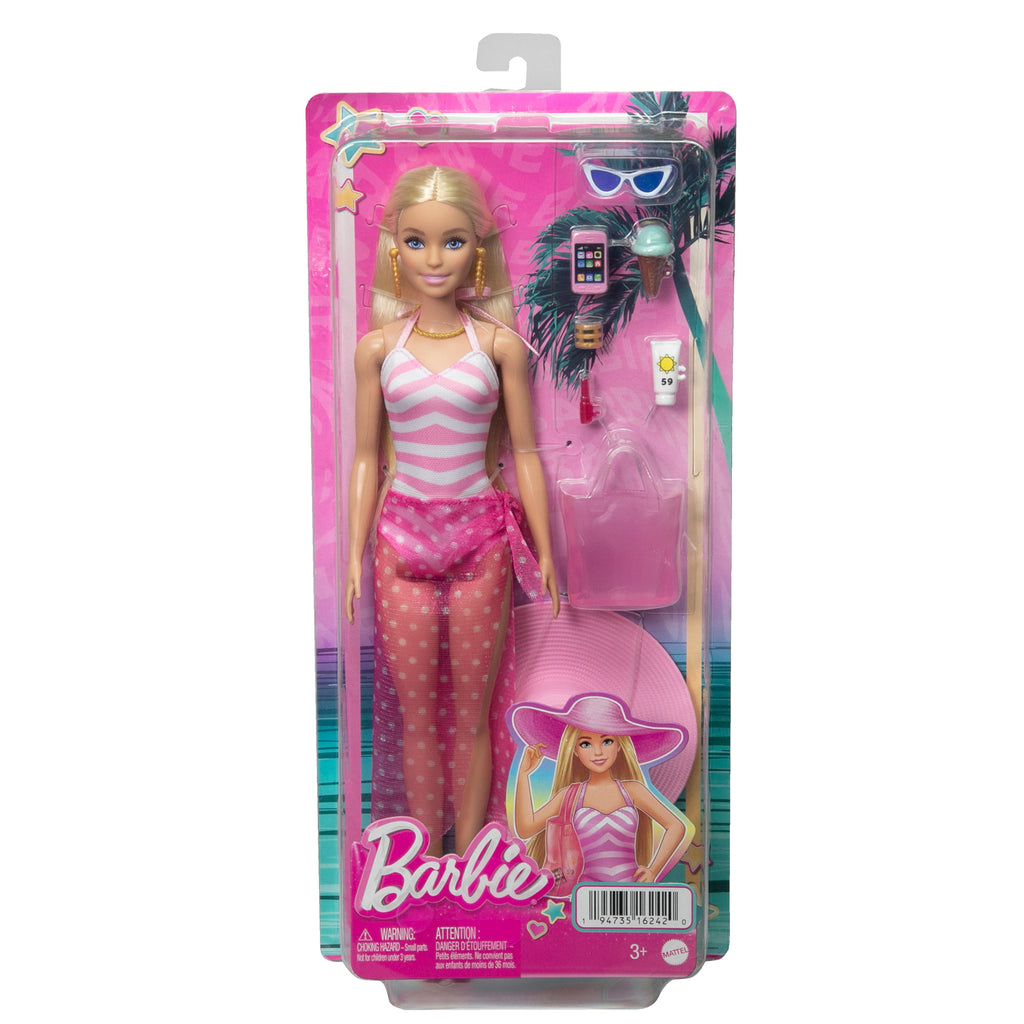 Mayosu ve plaj temalı aksesuarları olan sarışın Barbie® bebek