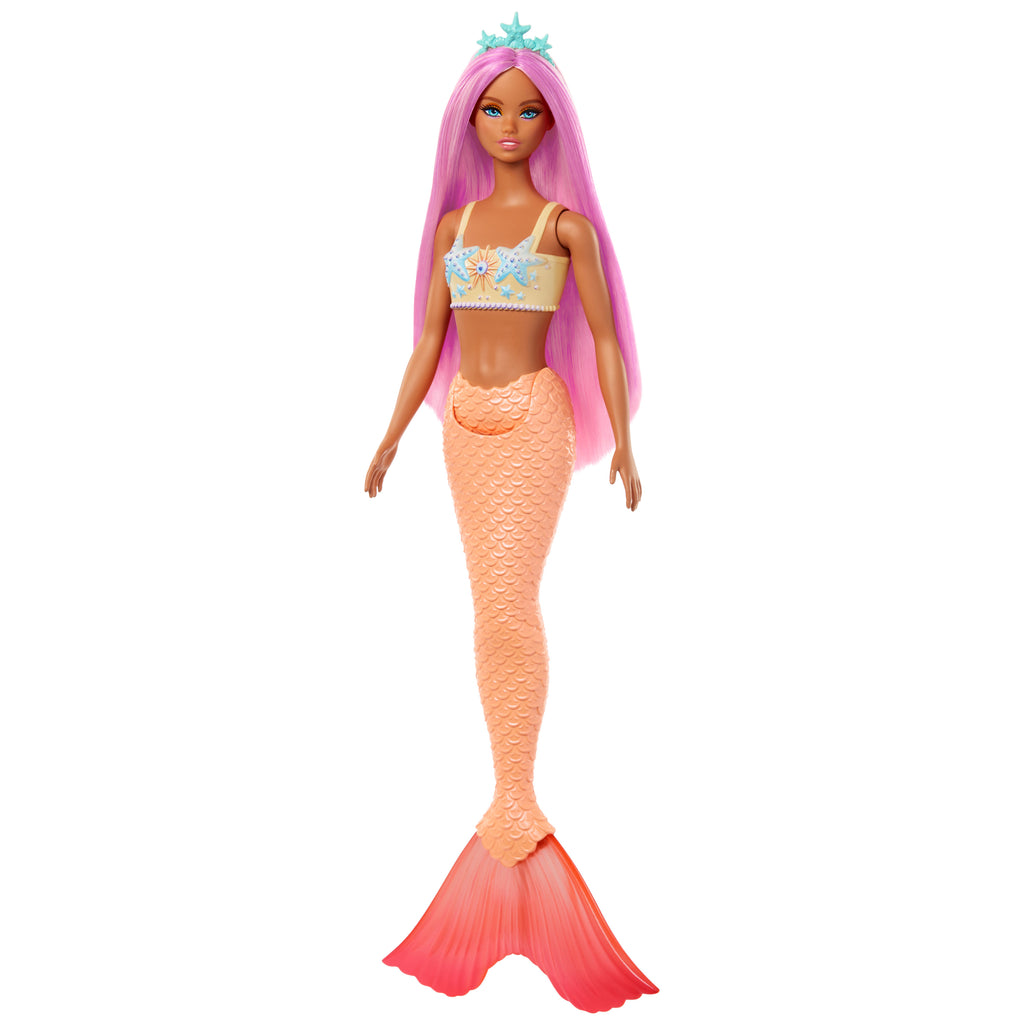 Pembe saçları, şeftali rengi kuyruğu ve saç aksesuarıyla Barbie deniz kızı bebek