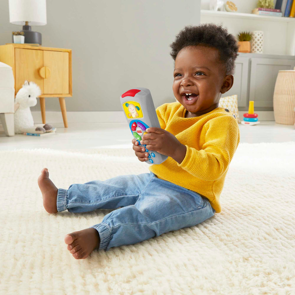 Türkçe dil desteğiyle bebekler ve yürüme çağındaki çocuklar için ışıklar ve şarkılar içeren, eğitici Fisher-Price® Eğlen ve Öğren® Köpekçiğin Uzaktan Kumandası