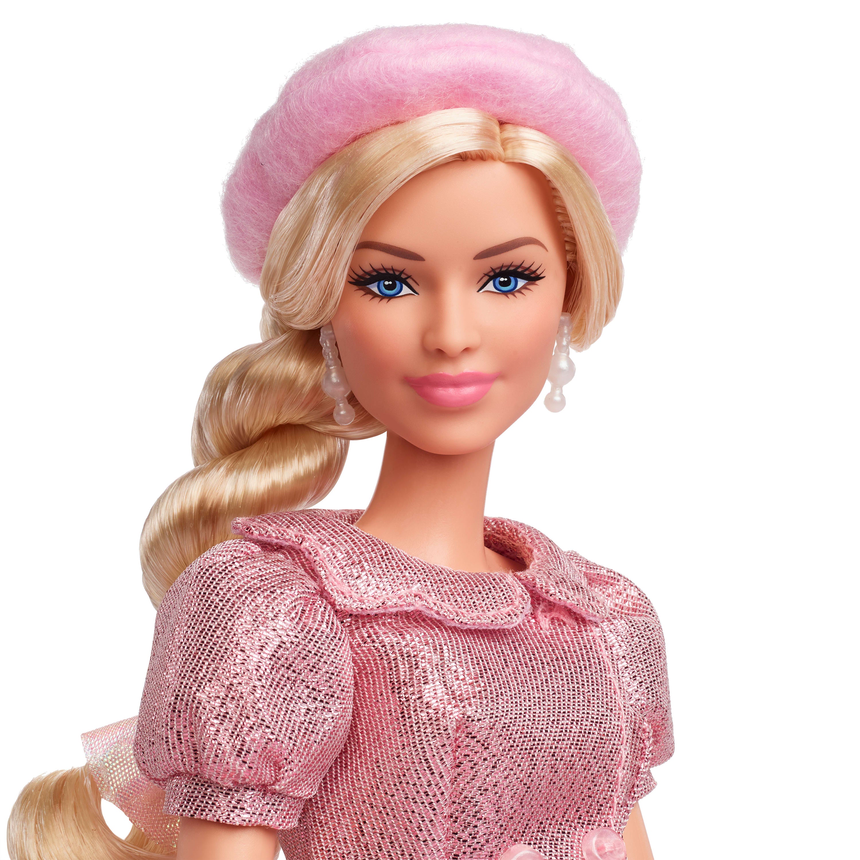 Margot Robbie'nin Barbie'yi canlandırdığı filmden, uyumlu pembe bluzu ve eteğiyle koleksiyona uygun Barbie bebek