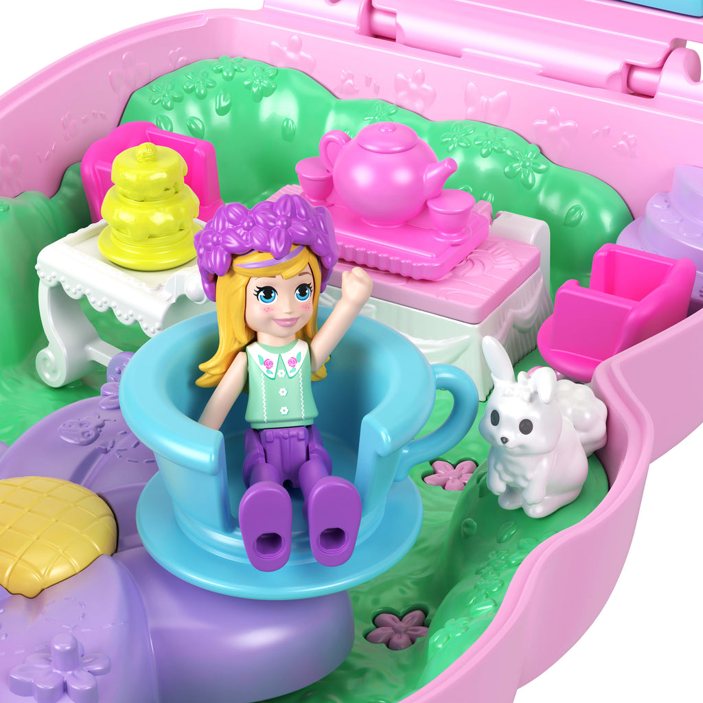 Polly Pocket Tavşancığın Çay Partisi mini oyun seti, 1 mikro bebek ve evcil tavşanlar, stil aksesuarlarının yer aldığı seyahat oyuncağı