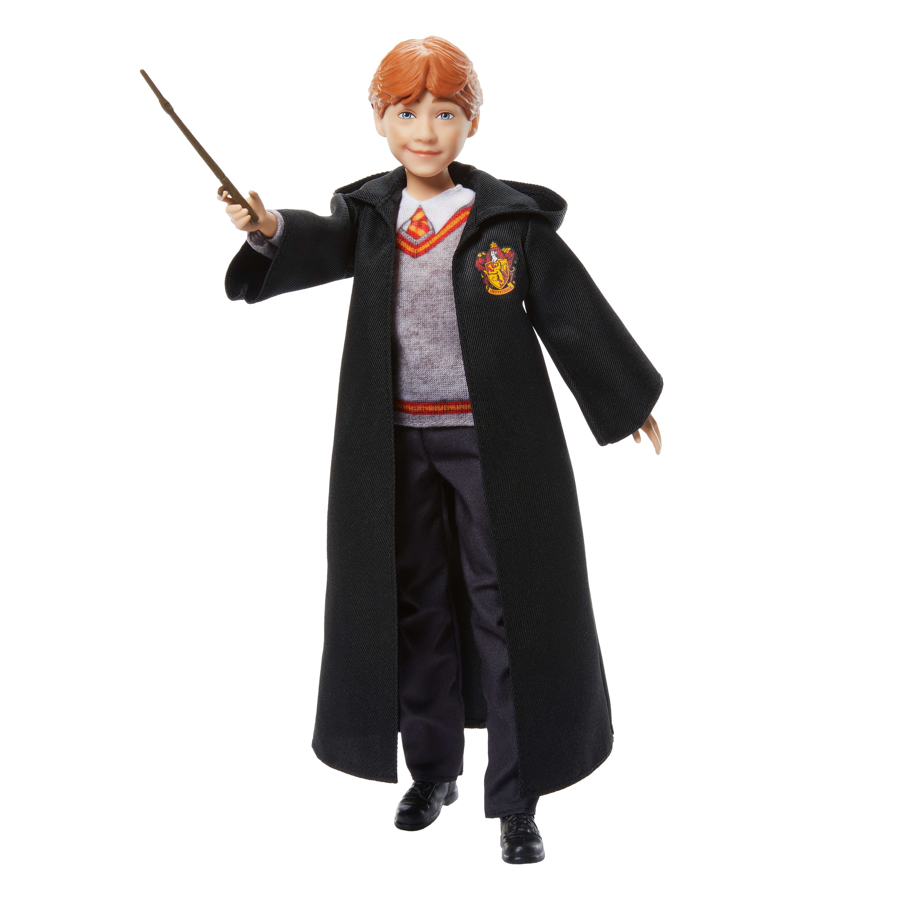 Karakteristik Hogwarts üniforması ve asasıyla birlikte filmden ilham alan Ron Weasley figürü