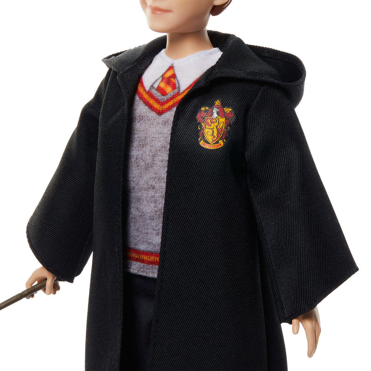 Karakteristik Hogwarts üniforması ve asasıyla birlikte filmden ilham alan Ron Weasley figürü
