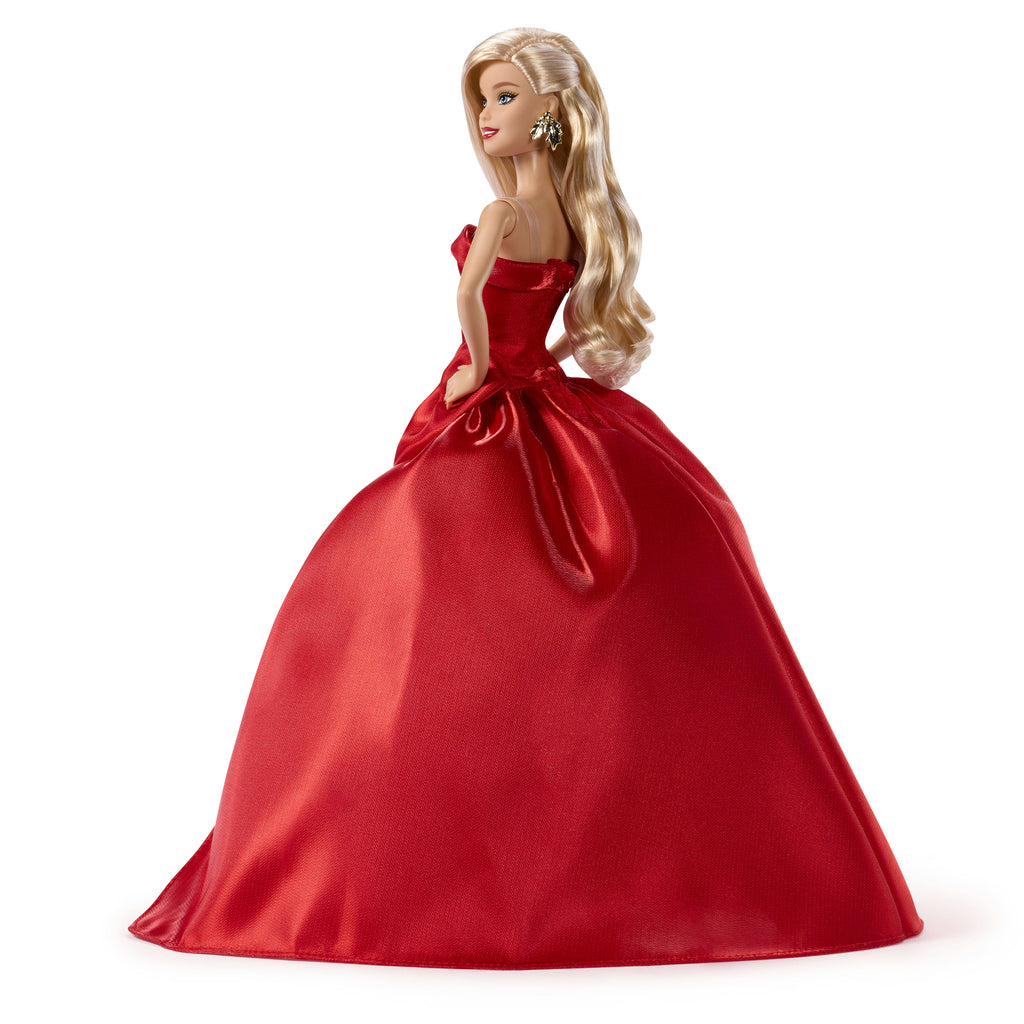 Barbie Signature 2026 Mutlu Yıllar Barbie bebeği, sezona özel koleksiyon ürünü, fiyonk detaylı kırmızı elbise giyen sarı saçlı bebek