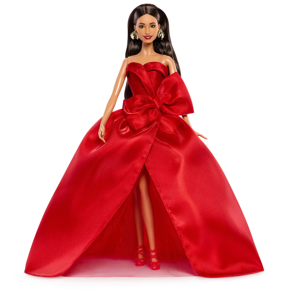 Barbie Signature 2026 Mutlu Yıllar Barbie bebeği, sezona özel koleksiyon ürünü, fiyonk detaylı kırmızı elbise giyen kahverengi saçlı bebek
