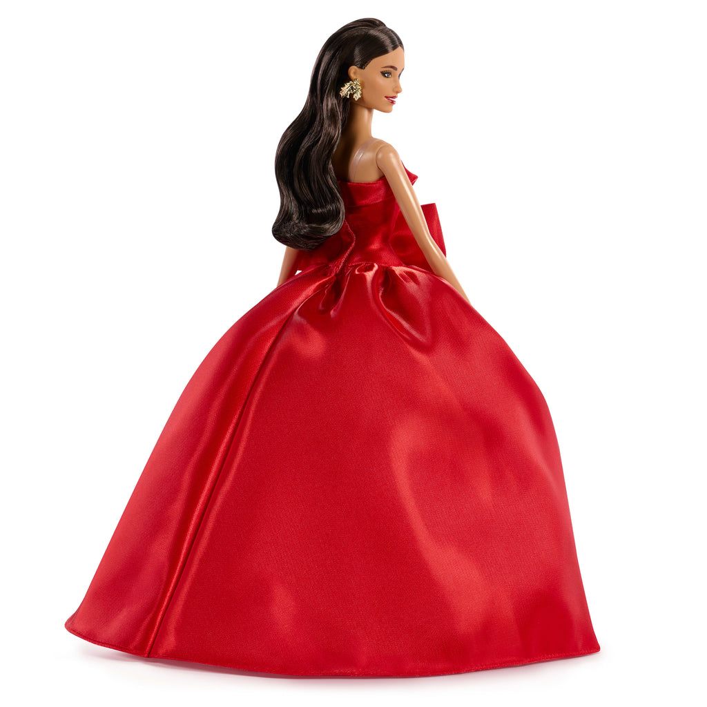 Barbie Signature 2026 Mutlu Yıllar Barbie bebeği, sezona özel koleksiyon ürünü, fiyonk detaylı kırmızı elbise giyen kahverengi saçlı bebek