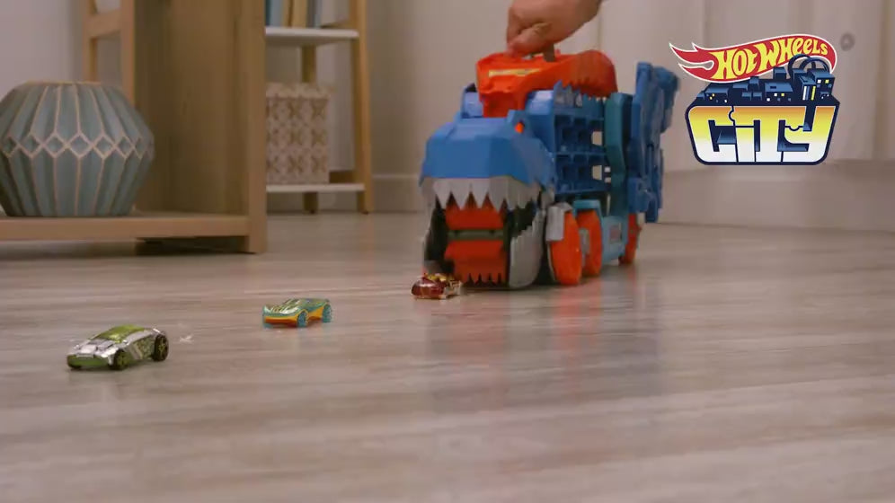 Hot Wheels™ City Ultimate T-Rex Tır – Işıklı Sesli Dönüşen Taşıyıcı ve Yarış Pisti Seti